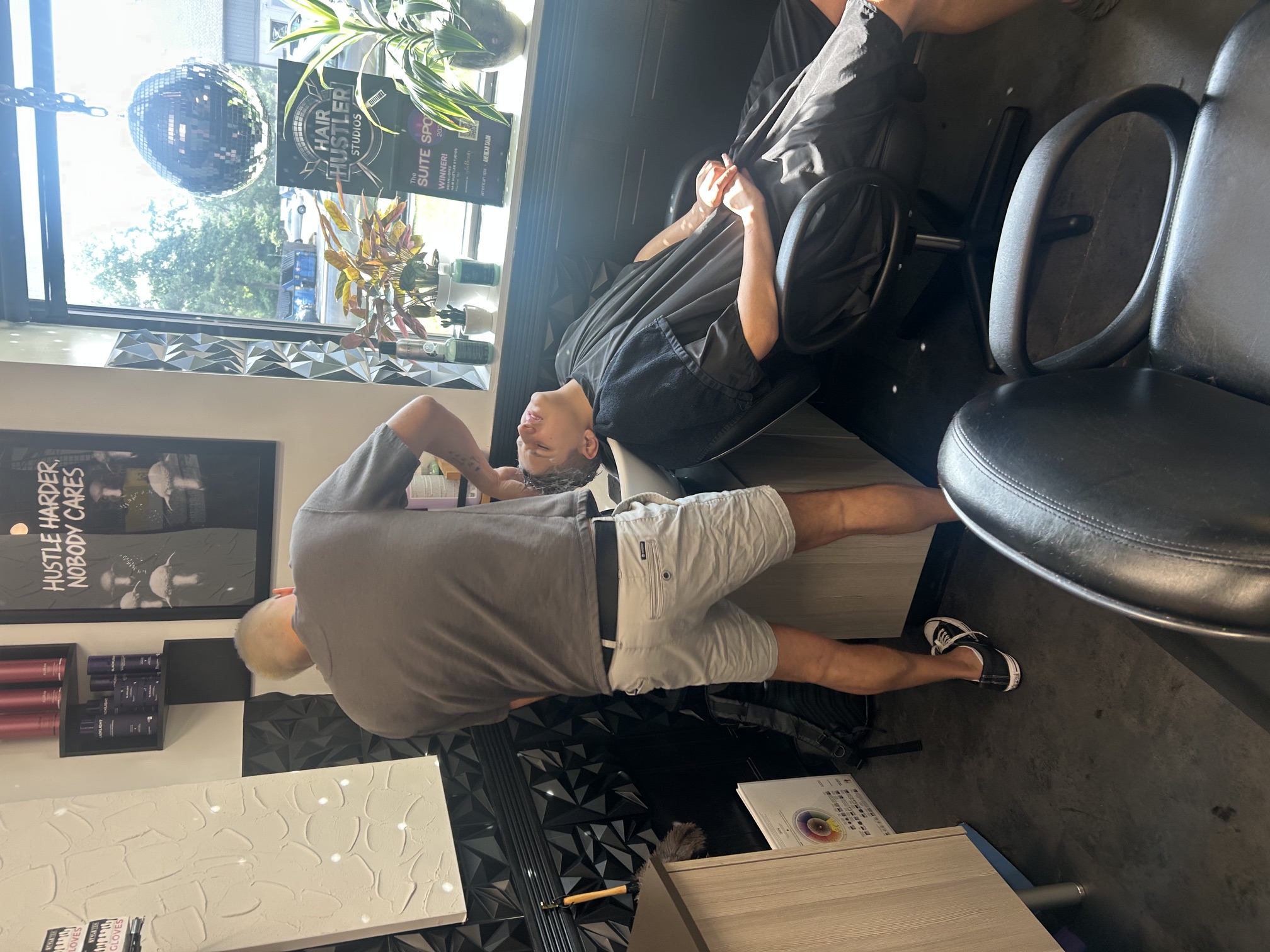 Brian taking time to prepare a young client before their cut
